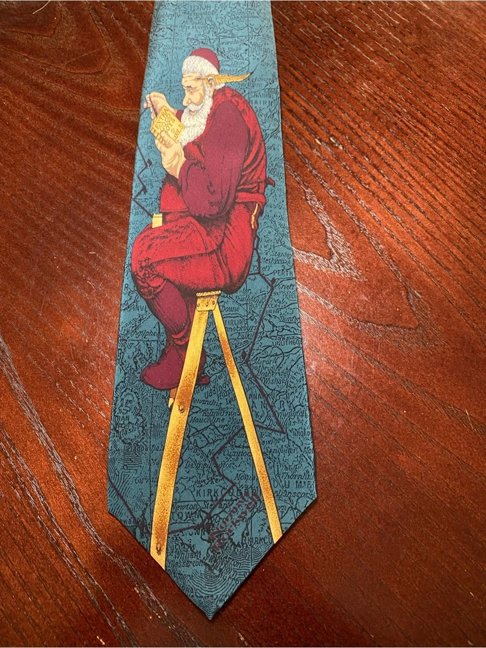 Norman Rockwell Christmas Neck Tie. Santa on ladder looking at Christmas lists